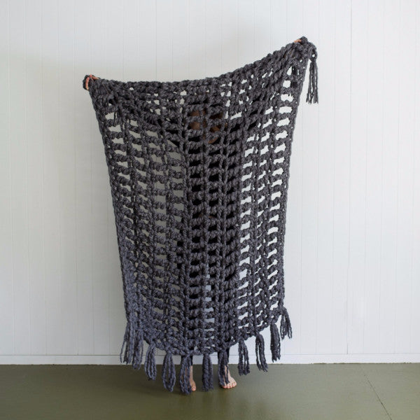 Large crochet bed throw made using Plump & Co chunky yarn