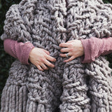 Plump & Co chunky knit blanket in grey giant yarn 2 ply made of felted New Zealand merino bulky wool using extreme knitting needles, XXL knitting and giant crochet hooks, Individual bumps, ottomans, giant weaving, cushions, bowls, wall hangings, key rings, and extreme knitting kits available. Worldwide shipping to USA, Canada, UK, Australia, Texas, New Zealand, Japan, Korea 