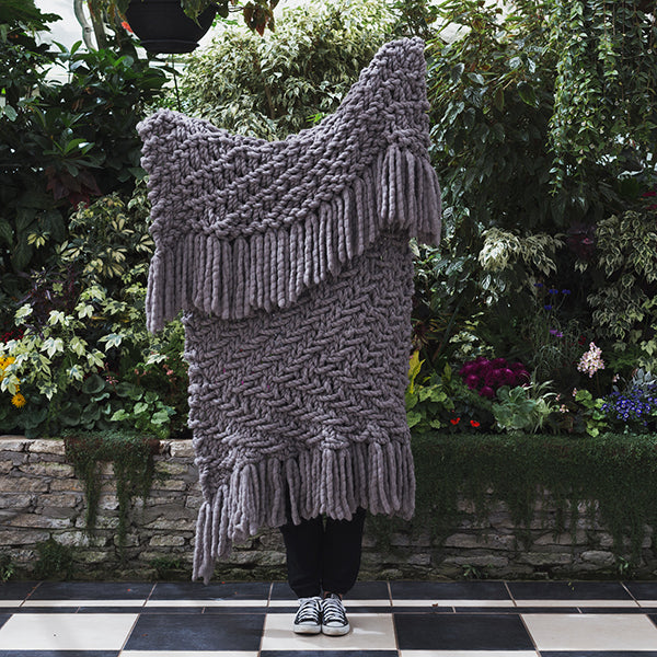 Plump & Co chunky knit blanket in grey giant yarn 2 ply made of felted New Zealand merino bulky wool using extreme knitting needles, XXL knitting and giant crochet hooks, Individual bumps, ottomans, giant weaving, cushions, bowls, wall hangings, key rings, and extreme knitting kits available. Worldwide shipping to USA, Canada, UK, Australia, Texas, New Zealand, Japan, Korea 