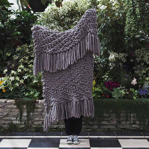 Plump & Co chunky knit blanket in grey giant yarn 2 ply made of felted New Zealand merino bulky wool using extreme knitting needles, XXL knitting and giant crochet hooks, Individual bumps, ottomans, giant weaving, cushions, bowls, wall hangings, key rings, and extreme knitting kits available. Worldwide shipping to USA, Canada, UK, Australia, Texas, New Zealand, Japan, Korea 