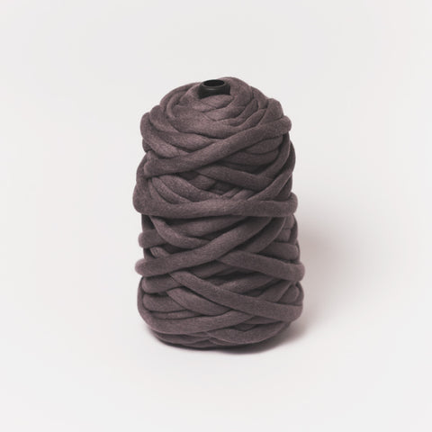 Plump & Co's giant yarn in midnight 1 ply. Use our plumptious XXL New Zealand merino wool with our giant knitting needles or extreme crochet hooks to make your own chunky knit blanket or throw. Individual bumps and extreme knitting kits available. Worldwide shipping, free shipping to New Zealand and Australia!