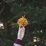 Create this chunky arm knitted DIY Christmas pompom using chunky wool mini 2ply cheese merino yarn of Plump & Co 2 ply white pink grey and mustard yarn, from Plump & Co. in New Zealand and Australia. With chunky wool merino knits and layers of textures for your home inspiration.