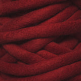 Plump & Co's giant yarn in red 1 ply. Use our plumptious XXL New Zealand merino wool with our giant knitting needles or extreme crochet hooks to make your own chunky knit blanket or throw. Perfect for arm knitting. Worldwide shipping, free shipping to New Zealand and Australia!