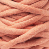 Plump & Co's giant yarn in Apricot Coral Orange 1 ply. Use our plumptious XXL New Zealand merino wool with our giant knitting needles or extreme crochet hooks to make your own chunky knit blanket or throw. Perfect for arm knitting. Worldwide shipping, free shipping to New Zealand and Australia!