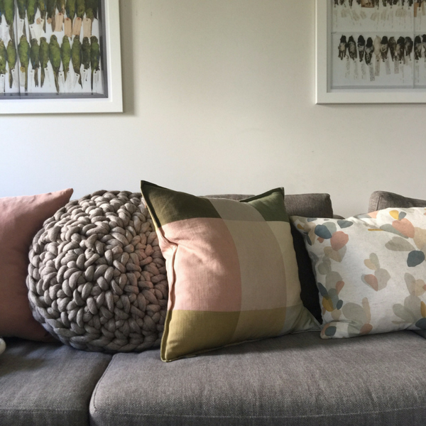 Large round crochet cushion made using Plump & Co chunky yarn