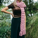 Chunky knit pink yarn scarf made in new Zealand using 2 ply xxl wool and giant knitting needles, shipping worldwide, plump and co also make giant woollen, merino blankets, ottomans, wall hangings, jumpers, bowls, slippers, plant holders, bags, pet beds, pillows and cushions 